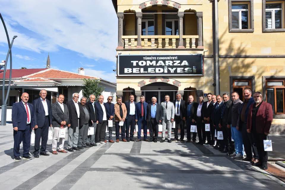KOÇ, MUHTARLARl MAKAMINDA AĞlRLADl